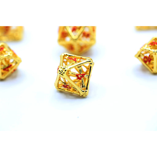 Death's Treasure Shiny Gold with Red Hollow Metal Dice - Premium Polyhedral Dice Set - Just $79.99! Shop now at Retro Gaming of Denver