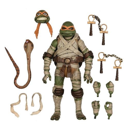 NECA  Universal Monsters X TMNT Michelangelo as The Mummy Ultimate 7-In Action Figure - Premium Action & Toy Figures - Just $35.99! Shop now at Retro Gaming of Denver