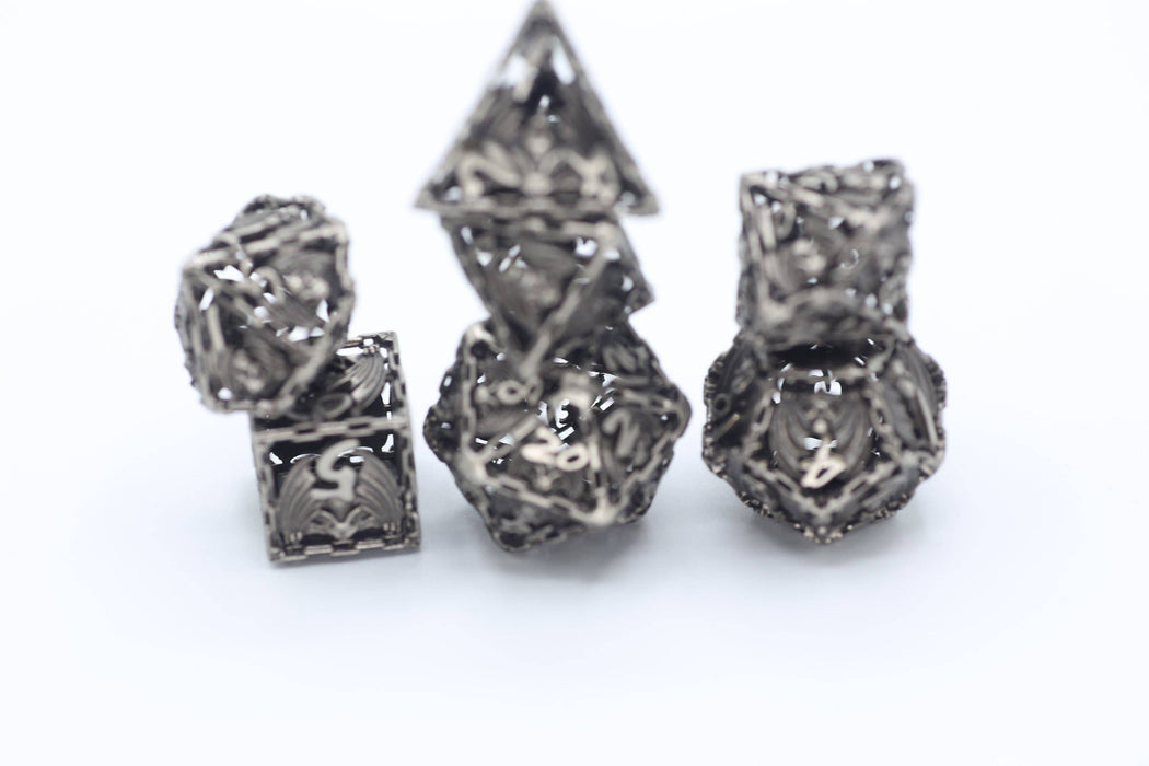 Ancient Silver Hollow Metal Bat Polyhedral Dice Set - for just $69.99! 