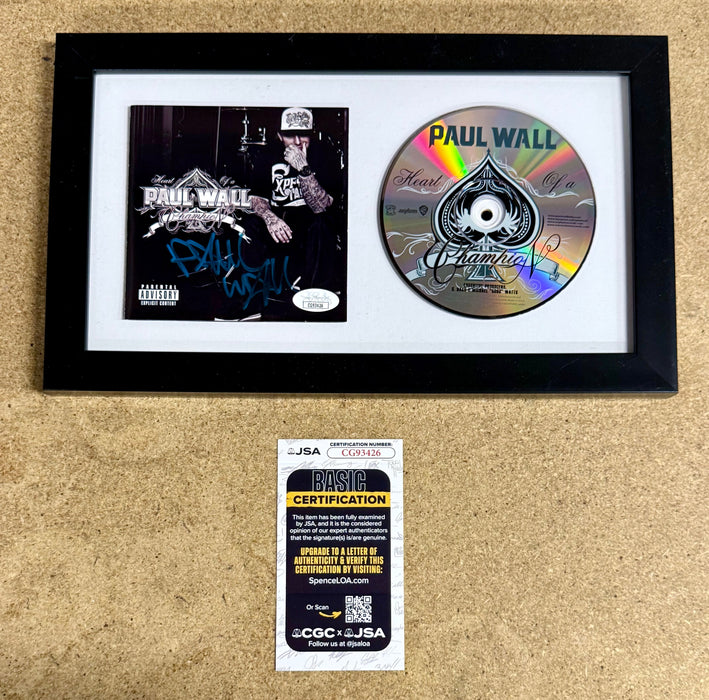 Rapper Paul Wall Signed “Heart Of A Champion” (2010) Framed CD With JSA COA - for just $150! 