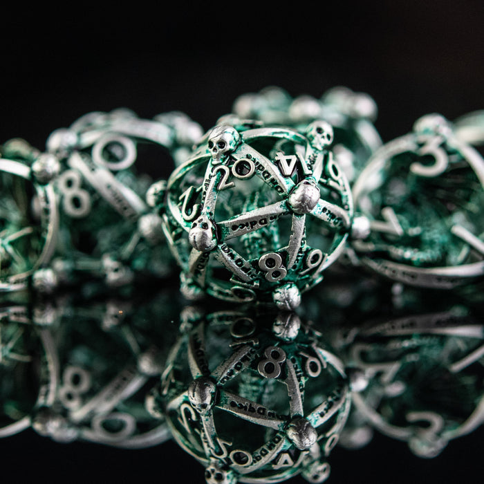 Draco Immortui Hollow Metal Dice Set - Green and Silver - Just $59.99! Shop now at Retro Gaming of Denver