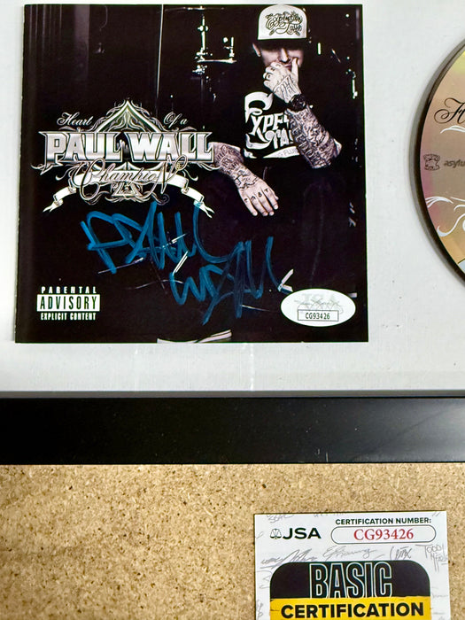 Rapper Paul Wall Signed “Heart Of A Champion” (2010) Framed CD With JSA COA - for just $150! 