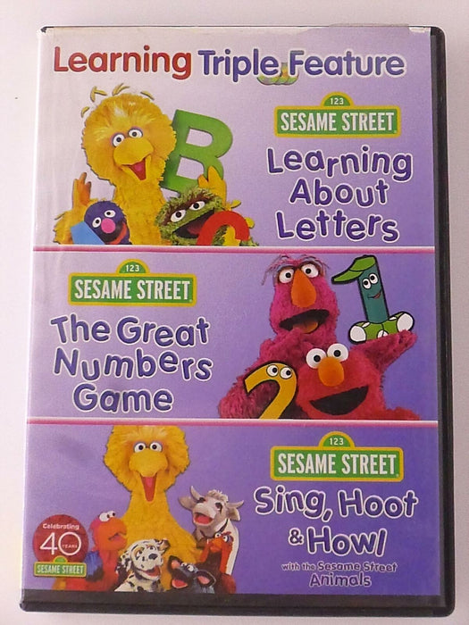 Sesame Street Learning Triple Feature - Letters, Numbers, Sing H.. (DVD) - J1105 - for just $1.99! 