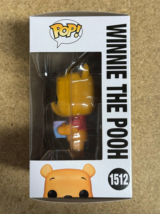 Funko Pop! Disney Winnie the Pooh With Honey Pot #1512 Winnie The Pooh 2024 - for just $13! 