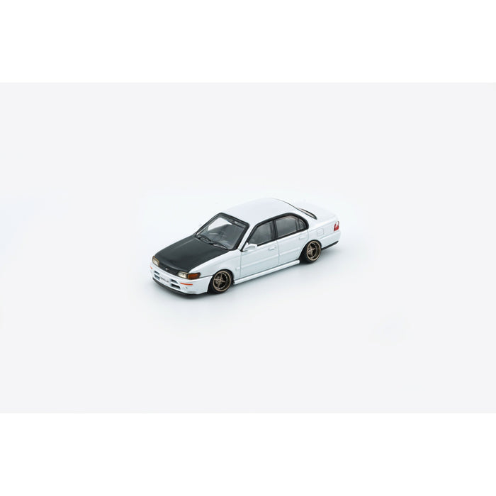 BM Creations Toyota Corolla AE100 in Pearl White with Carbon Fiber Hood RHD 1:64 64B0335 - Just $19.99! Shop now at Retro Gaming of Denver