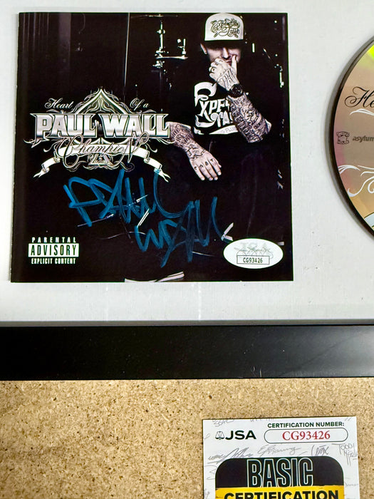 Rapper Paul Wall Signed “Heart Of A Champion” (2010) Framed CD With JSA COA - for just $150! 