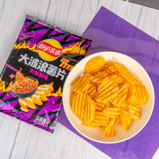 Lay's Wavy Potato Chips, Buldak Spicy Chicken Ramen Flavor, 2.47 oz - for just $4.99! 