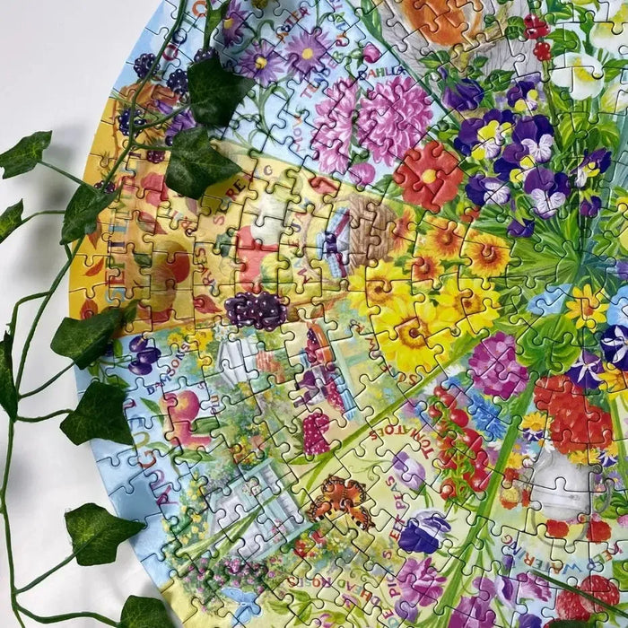 A Year in the Garden 500 Piece Round Jigsaw Puzzle Gibsons - for just $19.99! 