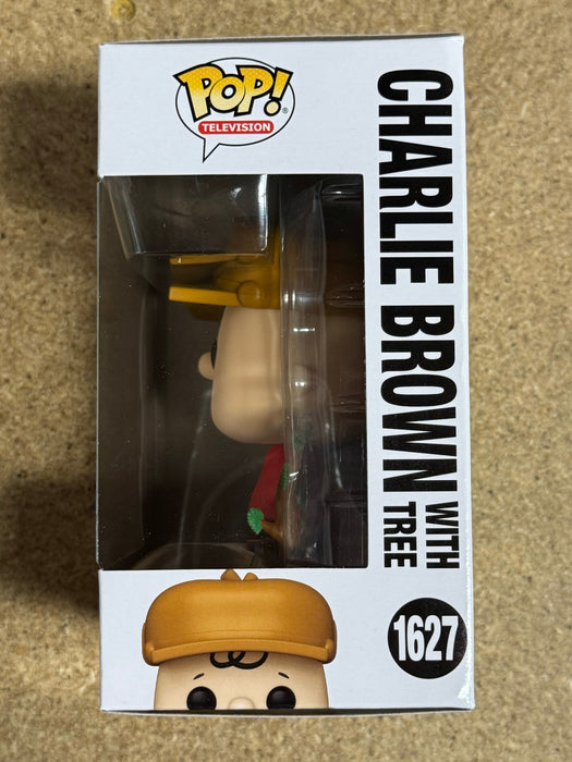 Funko Pop! Television Charlie Brown With Christmas Tree #1627 Peanuts 2024 - for just $13! 
