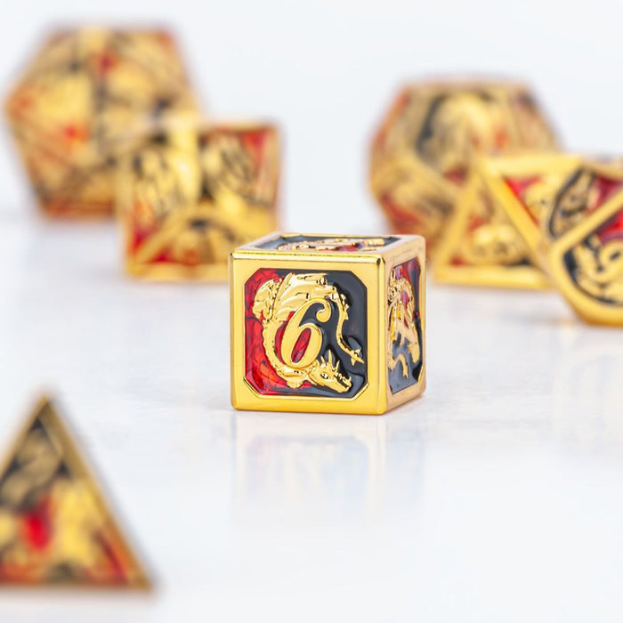 Solid Metal Dragon Polyhedral Dice Set -  Gold with Red/Black - Just $49.99! Shop now at Retro Gaming of Denver