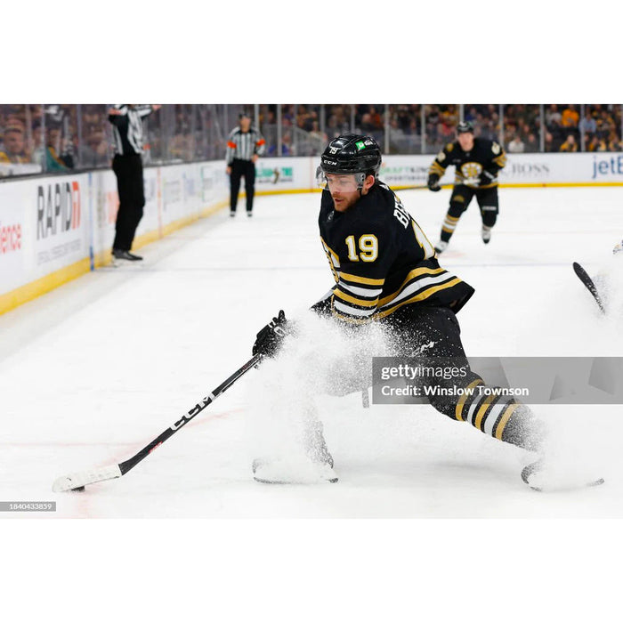 Johnny Beecher Boston Bruins Ice Action Hockey Photo - for just $9.99! 