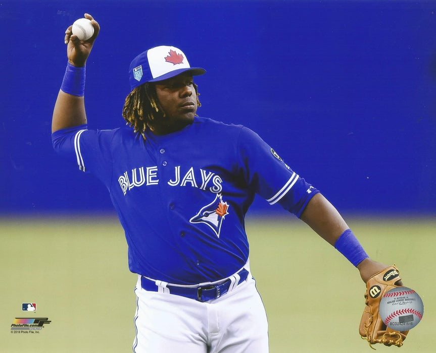 Vladimir Guerrero, Jr. Toronto Blue Jays Fielding Baseball Photo - for just $9.99! 