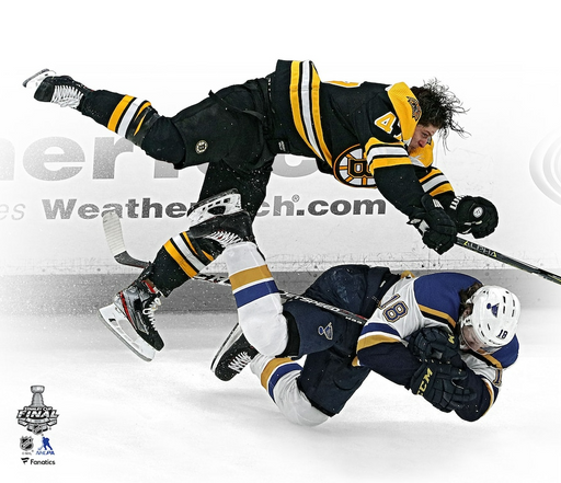 Torey Krug Boston Bruins 2019 Stanley Cup Finals Game 1 Hit 8" x 10" Hockey Photo - for just $9.99! 