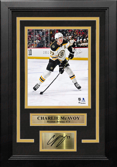 Charlie McAvoy in Action Boston Bruins 8" x 10" Vertical Framed Hockey Photo with Engraved Autograph - for just $79.99! 