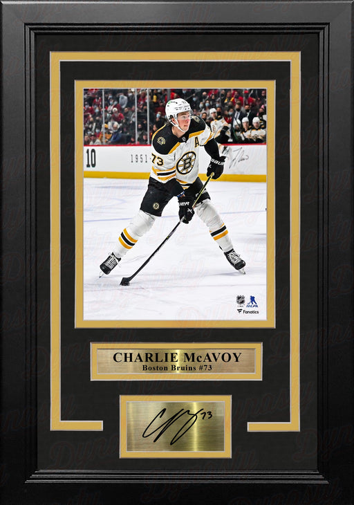 Charlie McAvoy in Action Boston Bruins 8" x 10" Vertical Framed Hockey Photo with Engraved Autograph - for just $79.99! 