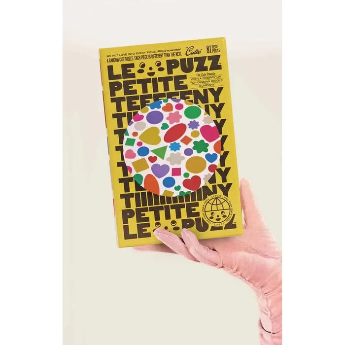 Cutie 81 Piece Round Jigsaw Puzzle Le Puzz - for just $24.99! 