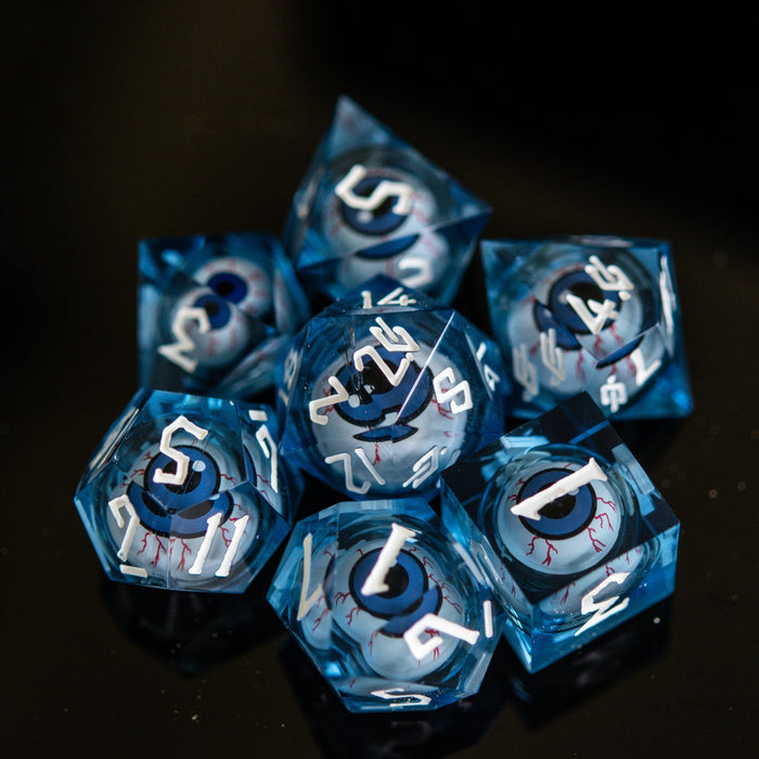 The Watcher: Blue-Eyed Liquid Core Dice Set - Just $59.99! Shop now at Retro Gaming of Denver