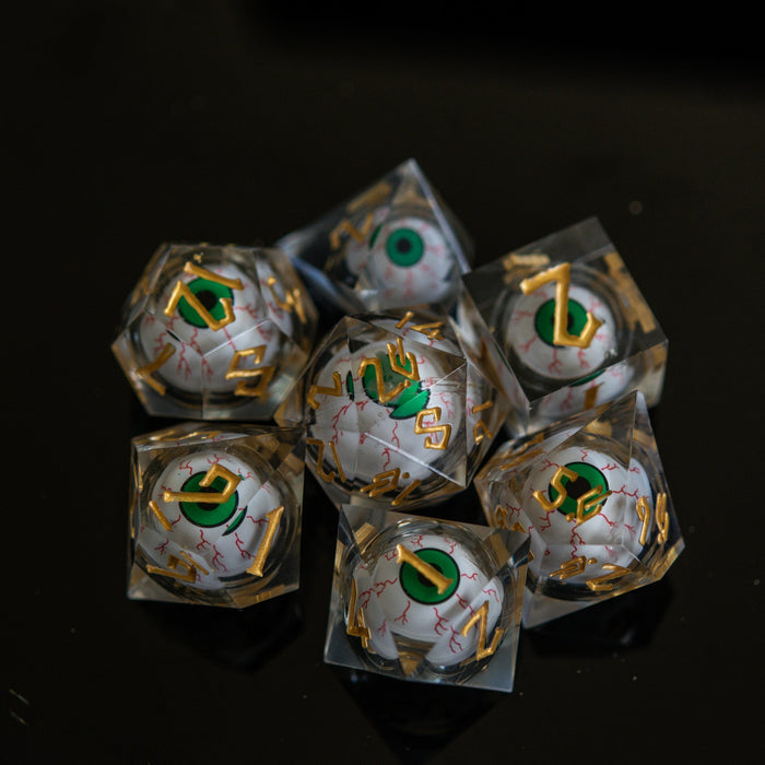 The Watcher: Green-Eyed Liquid Core Dice Set - Just $59.99! Shop now at Retro Gaming of Denver