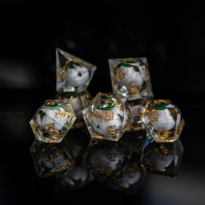 The Watcher: Green-Eyed Liquid Core Dice Set - Just $59.99! Shop now at Retro Gaming of Denver