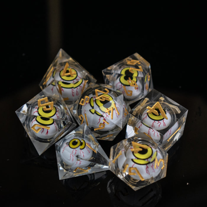 The Watcher: Yellow-Eyed Liquid Core Dice Set - Just $59.99! Shop now at Retro Gaming of Denver