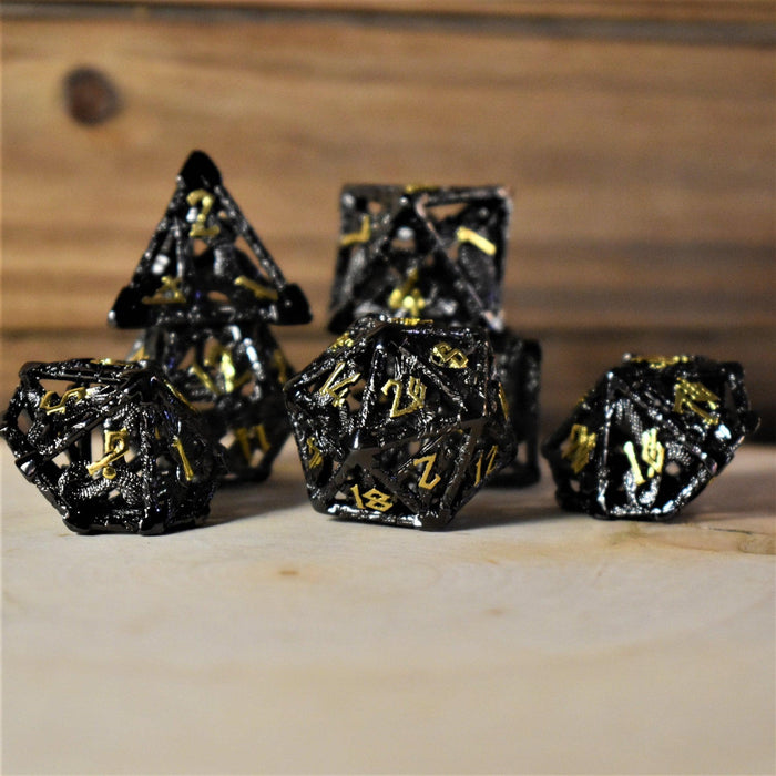 Legends of Valhalla - Black and Gold Hollow Metal Dice Set - Just $59.99! Shop now at Retro Gaming of Denver