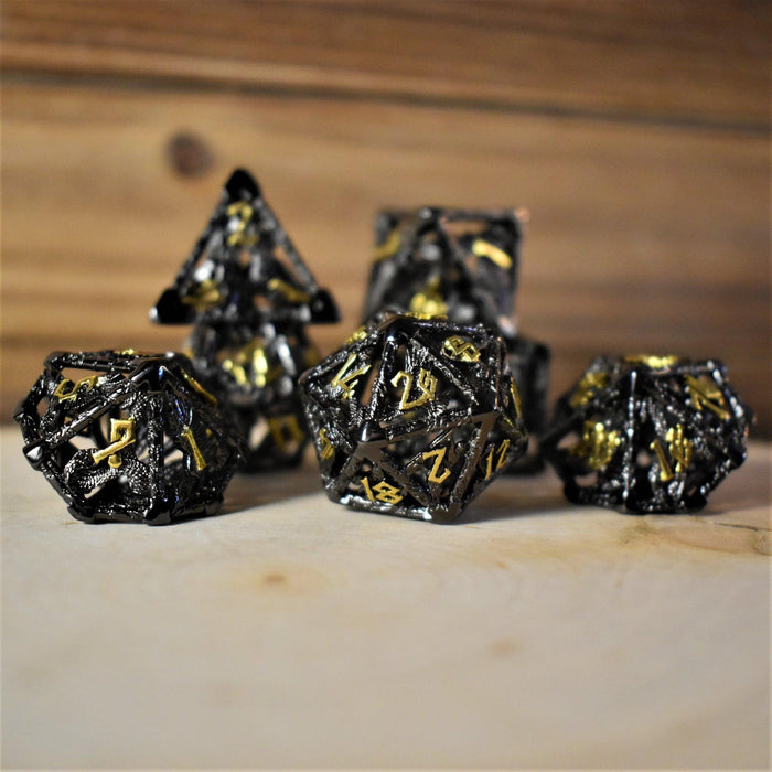 Legends of Valhalla - Black and Gold Hollow Metal Dice Set - Just $59.99! Shop now at Retro Gaming of Denver