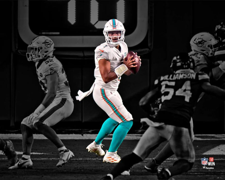 Tua Tagovailoa in Action Miami Dolphins 8" x 10" Blackout Football Photo - for just $9.99! 