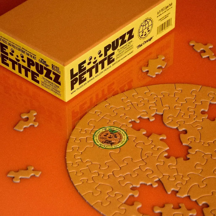 Flat Orange 81 Piece Round Jigsaw Puzzle Le Puzz - for just $24.99! 