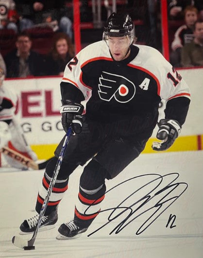 Simon Gagne in Action Philadelphia Flyers Autographed 8" x 10" Hockey Photo - for just $59.99! 