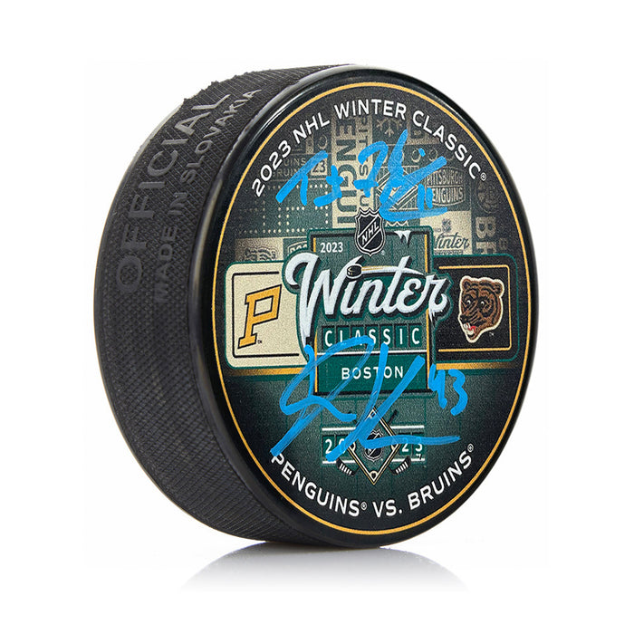 Trent Frederic & Danton Heinen Autographed Boston Bruins 2023 Winter Classic Hockey Logo Puck - for just $29! 