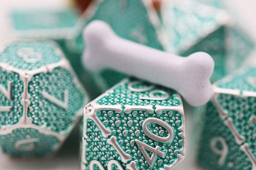 Grassy Paw Prints - Metal RPG Dice Set - for just $39.99! 