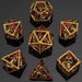 Skull's Grin Hollow Metal Dice Set - Gold with Red - Just $89.99! Shop now at Retro Gaming of Denver