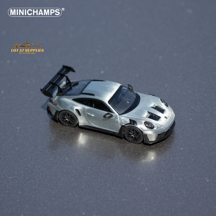 Minichamps X CLDC Exclusive Porsche 911 GT3 RS in Raw Silver English Magazine Version 1:64 (MAGAZINE INCLUDED) - Just $54.99! Shop now at Retro Gaming of Denver