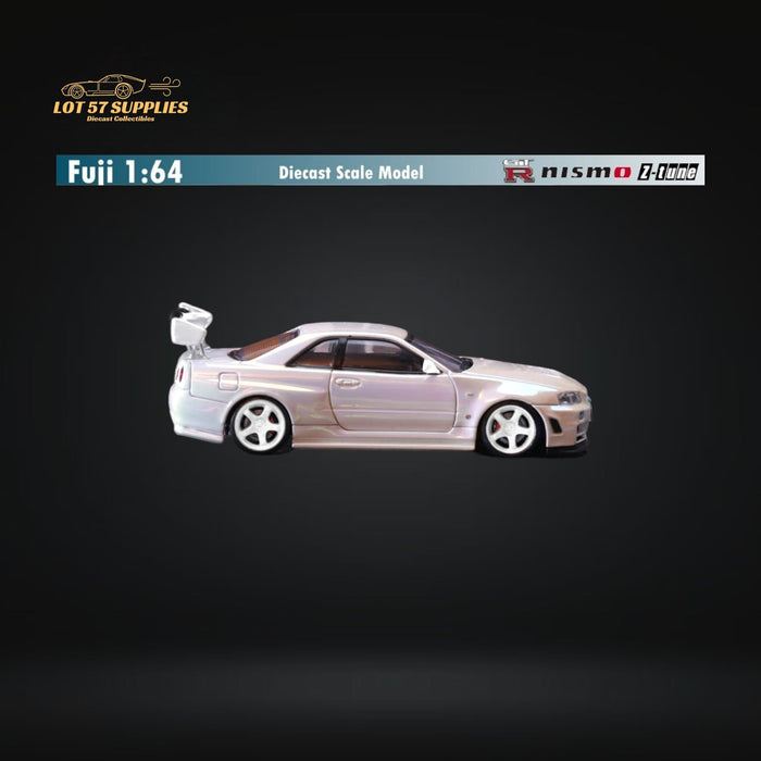 Fuji Skyline GT-R R34 Nismo Z-Tune High Wing White Pearl 1:64 - Just $34.99! Shop now at Retro Gaming of Denver