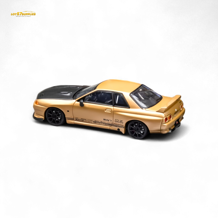 Focal Horizon Skyline GT-R R32 Top Secret Gold 1:64 - for just $37.99! 