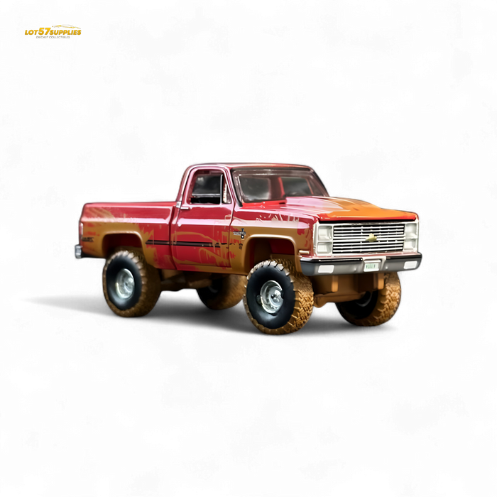 Auto World 1983 Chevrolet Silverado K10 4x4 Muddy LIFTED Squarebody 1:64 - for just $19.99! 