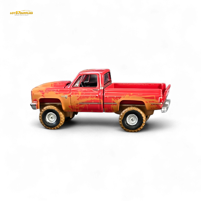 Auto World 1983 Chevrolet Silverado K10 4x4 Muddy LIFTED Squarebody 1:64 - for just $19.99! 