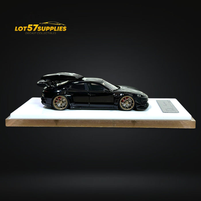 Error404 X Zephyr Designz Taycan in Black with Roof Box 1:64 - for just $74.99! 