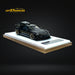 Error404 X Zephyr Designz Taycan in Black with Roof Box 1:64 - for just $74.99! 