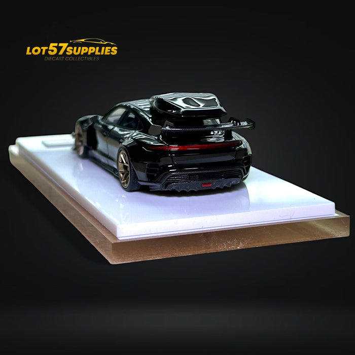 Error404 X Zephyr Designz Taycan in Black with Roof Box 1:64 - for just $74.99! 
