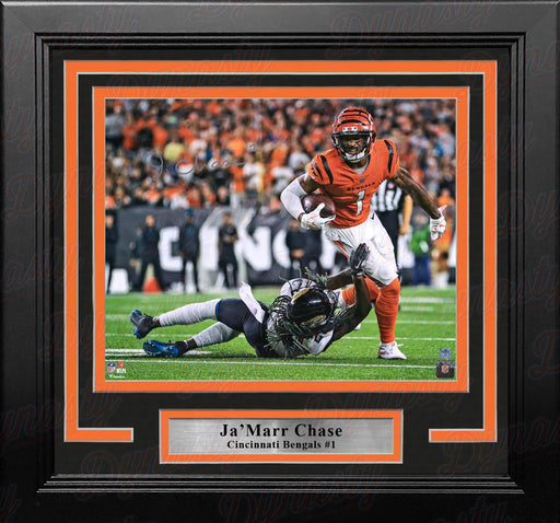 Ja'Marr Chase in Action Cincinnati Bengals Autographed 8" x 10" Framed Football Photo - for just $219.99! 