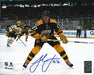 Hampus Lindholm 2023 Winter Classic Action Boston Bruins Autographed 11" x 14" Hockey Photo - for just $69.99! 