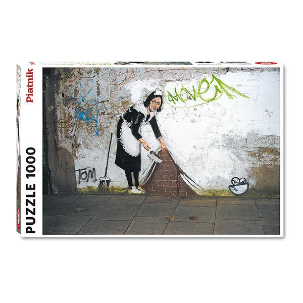 Maid (Sweep it Under the Carpet) by Banksy 1000 Piece Jigsaw Puzzle Piatnik - for just $24.99! 