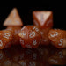 Orange Pearl Acrylic Dice Set - Just $9.99! Shop now at Retro Gaming of Denver