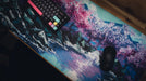 "Stream of Serenity" — Cherry Blossom Deskmat - for just $49.95! 