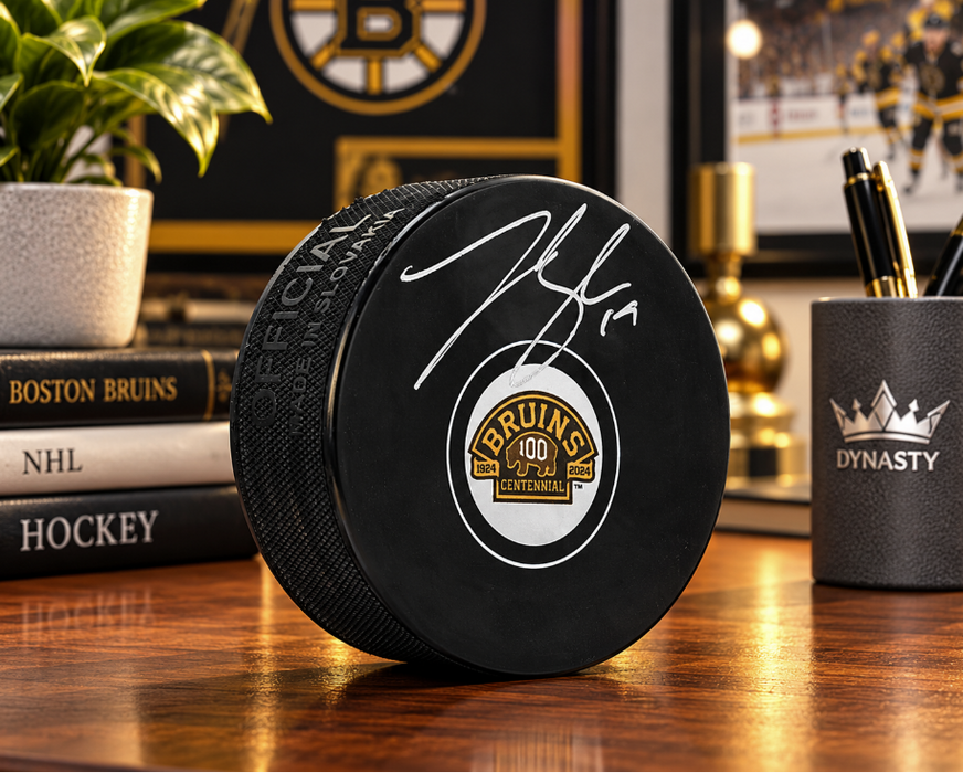 Johnny Beecher Autographed Boston Bruins 100th Anniversary Hockey Logo Puck - for just $25! 