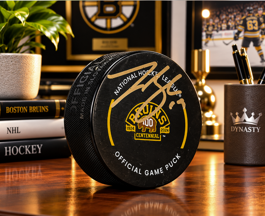 Johnny Beecher Boston Bruins Autographed 100th Anniversary Hockey Game Puck - for just $49! 