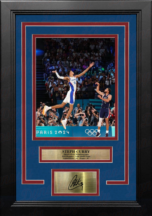 Steph Curry Shoots Over Wembanyama 8" x 10" Framed Olympics Basketball Photo with Engraved Autograph - for just $79.99! 
