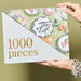 Table by the Sea 1000 Piece Jigsaw Puzzle Journey of Something - for just $24.99! 