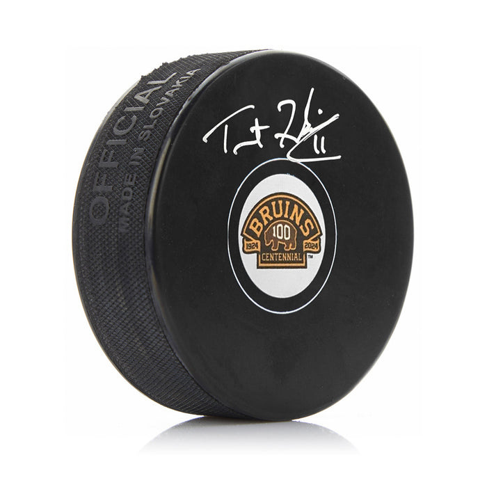 Trent Frederic Autographed Boston Bruins 100th Anniversary Hockey Logo Puck - for just $29! 